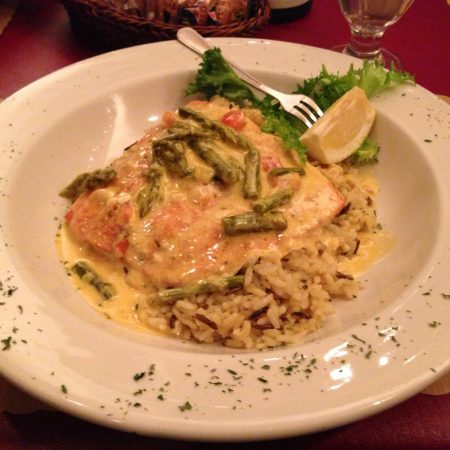 Delicious fish dish with lemon and garnish